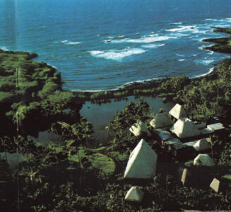 Historic aerial view of the former Punaluʻu Village and Black Sands Restaurant area along the Kaʻū coast of Hawaii