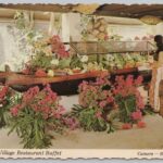 Punaluʻu Village Restaurant buffet featuring canoe-style serving tables during the Sea Mountain community era in Kaʻū, Hawaiʻi
