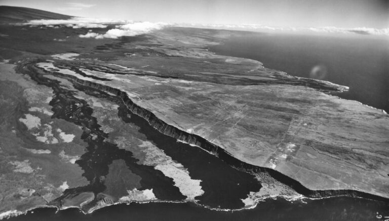 Aerial view of the Kaʻū coastline near Punaluʻu, Hawaiʻi Island, illustrating the rugged shoreline impacted by the 1868 earthquake and tsunami